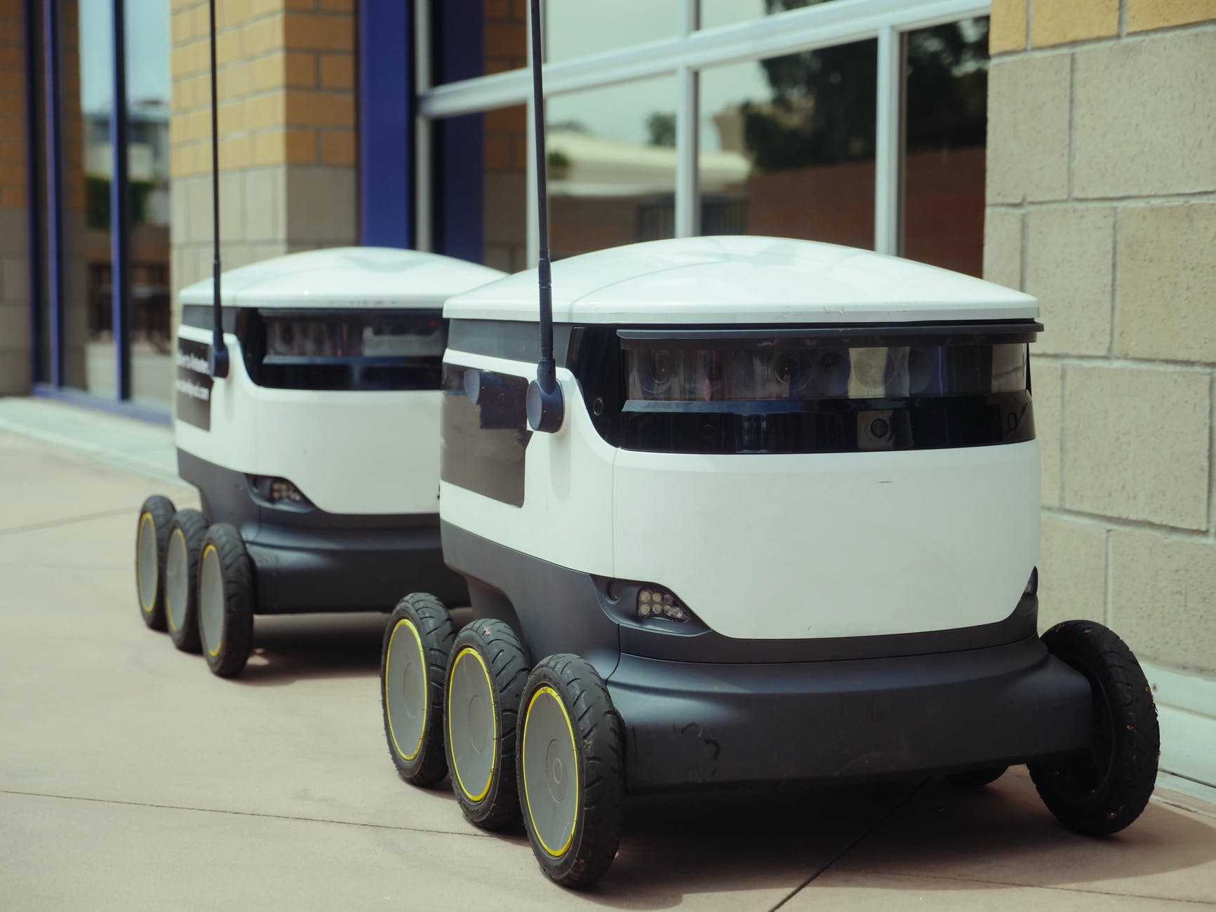 delivery robots beside building