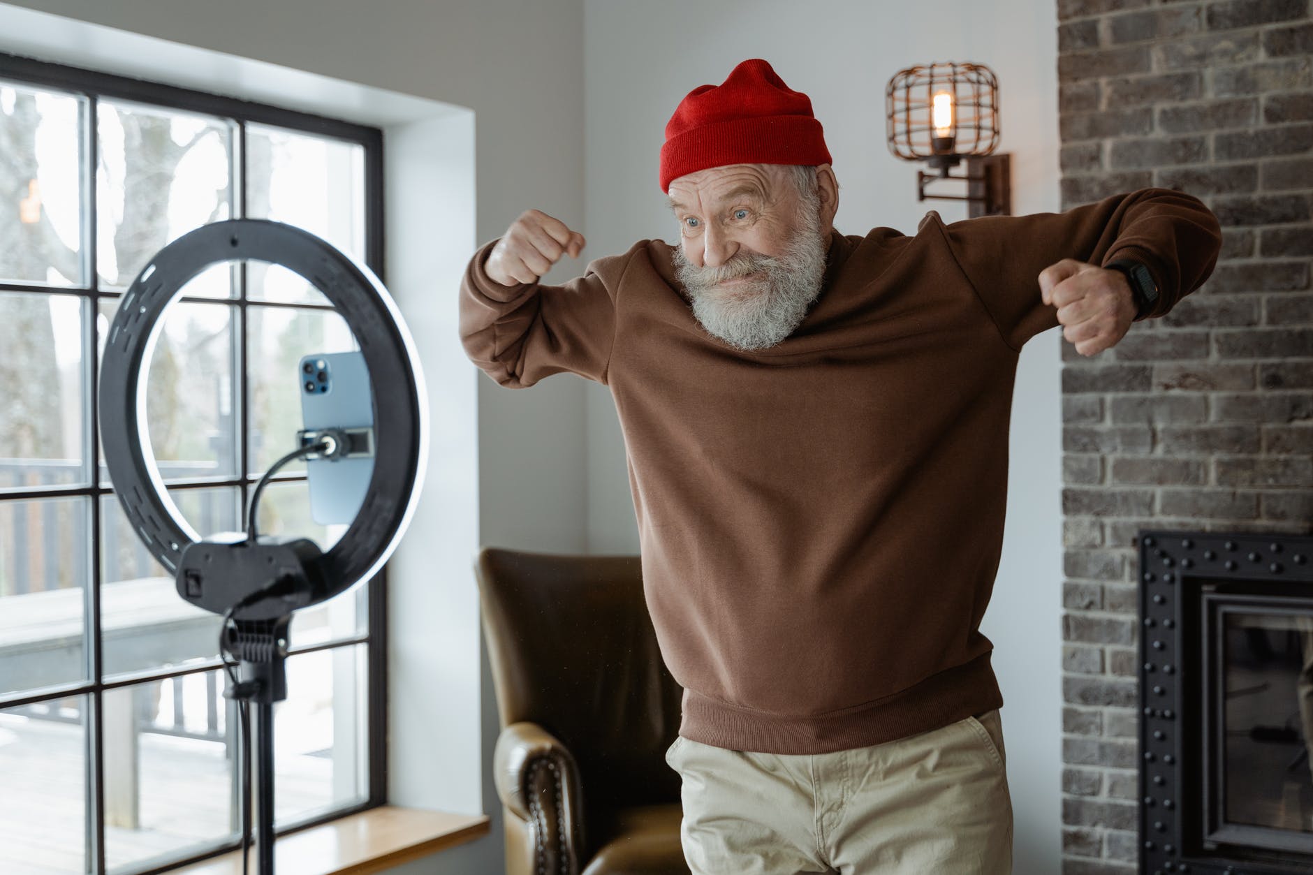 man in brown sweater being silly